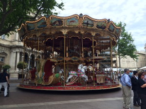 Merry Go Round in the Place de l'Horloge