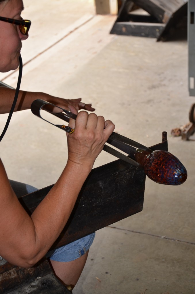 Shaping the hot glass