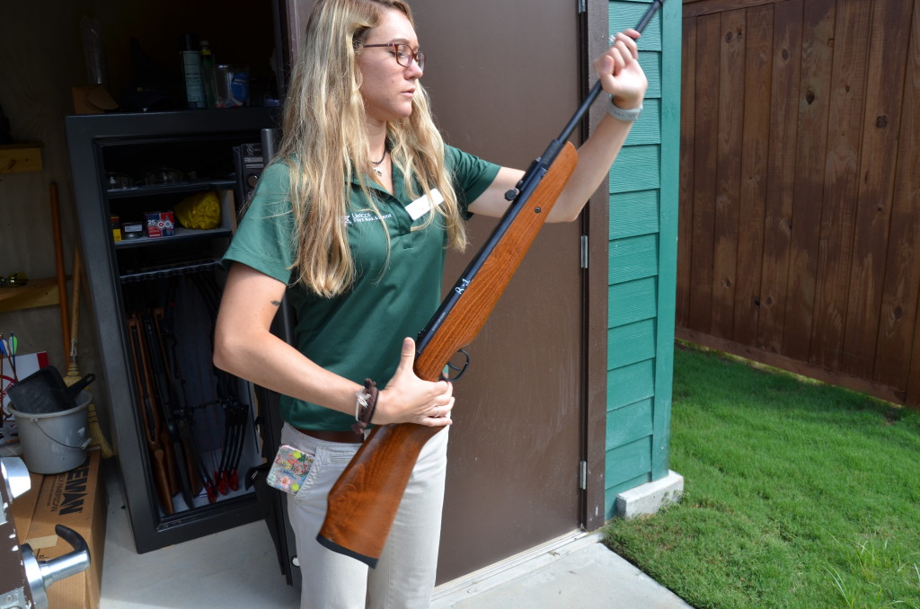 Demonstrating how to use the guns.